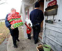 Firefighters deliver Christmas surprises