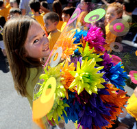 Bouquet Brigade -  Greenfield children participate in the annual Riley Festival Parade of Flowers