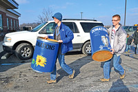 Art students roll out spruced-up food collection barrels