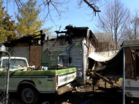 Investigators seek owner of burned house