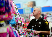 Police officers, deputies pick presents with children in need