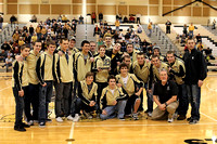 Lapel wrestlers win ICC, present trophy at boys basketball game