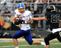 Airing it out: Marauders use big plays to top rival Cougars