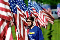 AN AVENUE OF RED, WHITE AND BLUE: Cemetery entrance fills with flags to honor Hancock County veterans