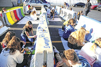 Students transform parking barriers into art projects