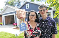 Home sweet home: Habitat for Humanity presents keys to its newest homeowner