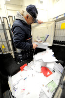 Postal workers take increased holiday workload in stride