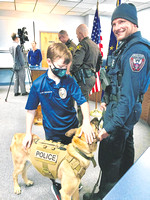 BADGE OF HONOR: Boys' generosity earns them special police powers