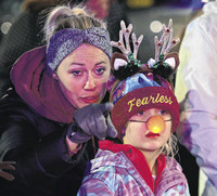 TINSEL TOWN: Ceremony turns plaza into a glittering holiday wonderland