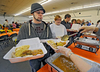 300 volunteers mobilize to prepare and serve meals for 1,500