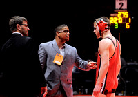 Red hired as wrestling coach; Holden double duty