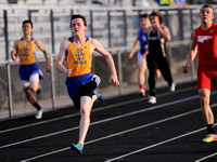 Boys county track - Cougars put it all together for title