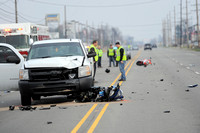 Car strikes moped on U.S. 40; one man injured